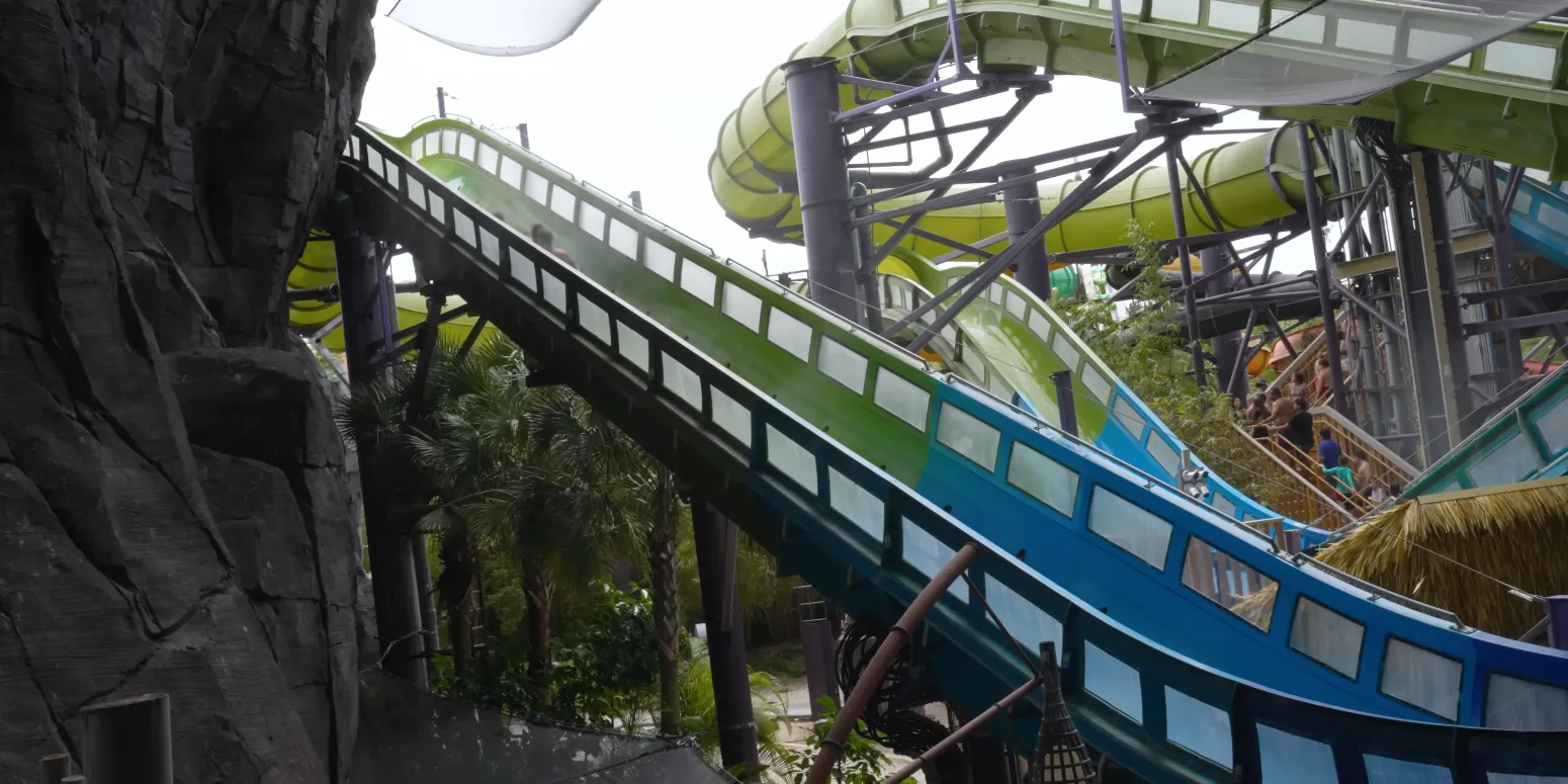 Universal Volcano Bay Guide 2026: Tickets, Rides & Tips 2 Krakatau Aqua Coaster canoes climbing through Universal Volcano Bay