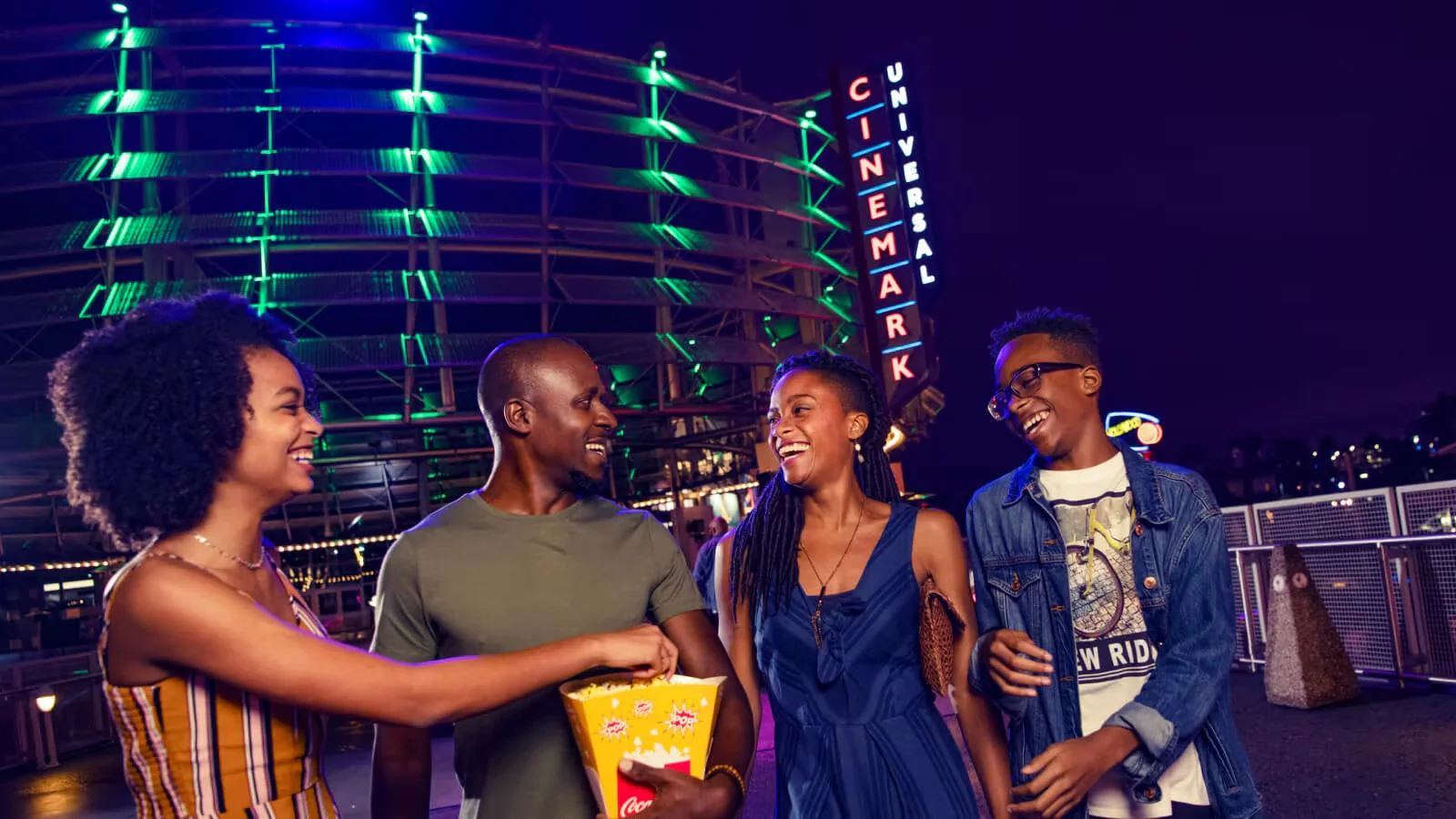 Universal Orlando Summer 2026: Best Things to Do, What to Prioritize, and What to Skip 5 Family with popcorn outside Universal Cinemark at CityWalk