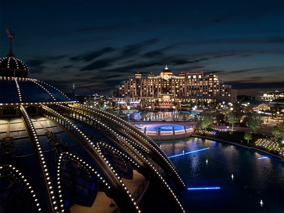 Universal Orlando Fall 2026 Guide: Events, Weather & Tips 1 Celestial Park illuminated at night with Universal Helios Grand Hotel in the distance
