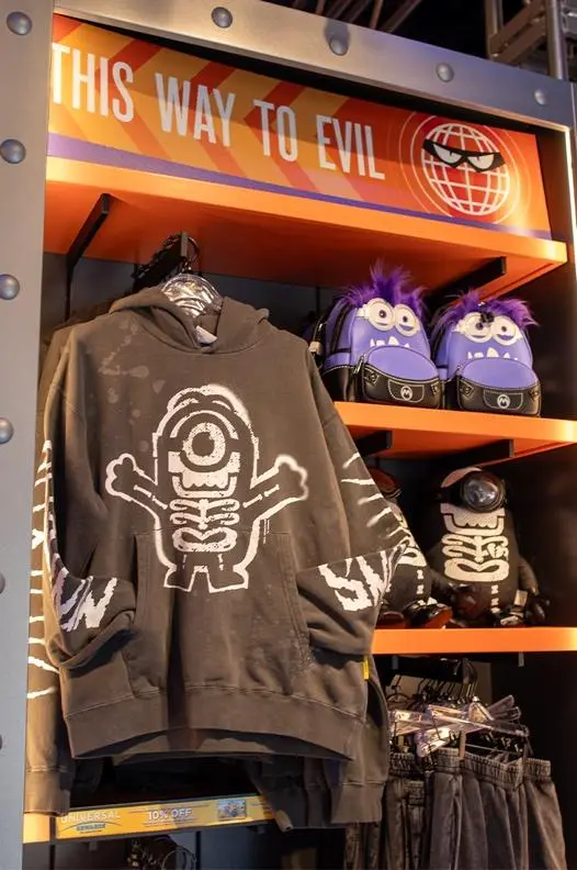 Best Minion Land Souvenirs at Universal Studios Florida 5 Minion sweatshirts hanging in a Minion Land shop