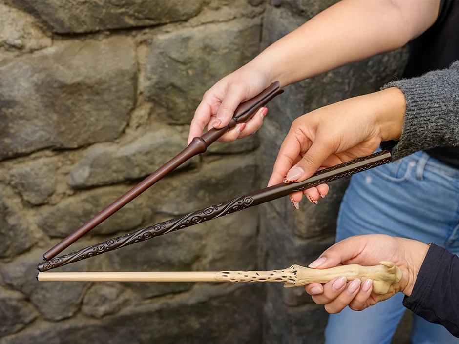 Back to Hogwarts 2026 Spans All 3 Universal Orlando Parks 4 Guests casting spells with second-generation interactive wands