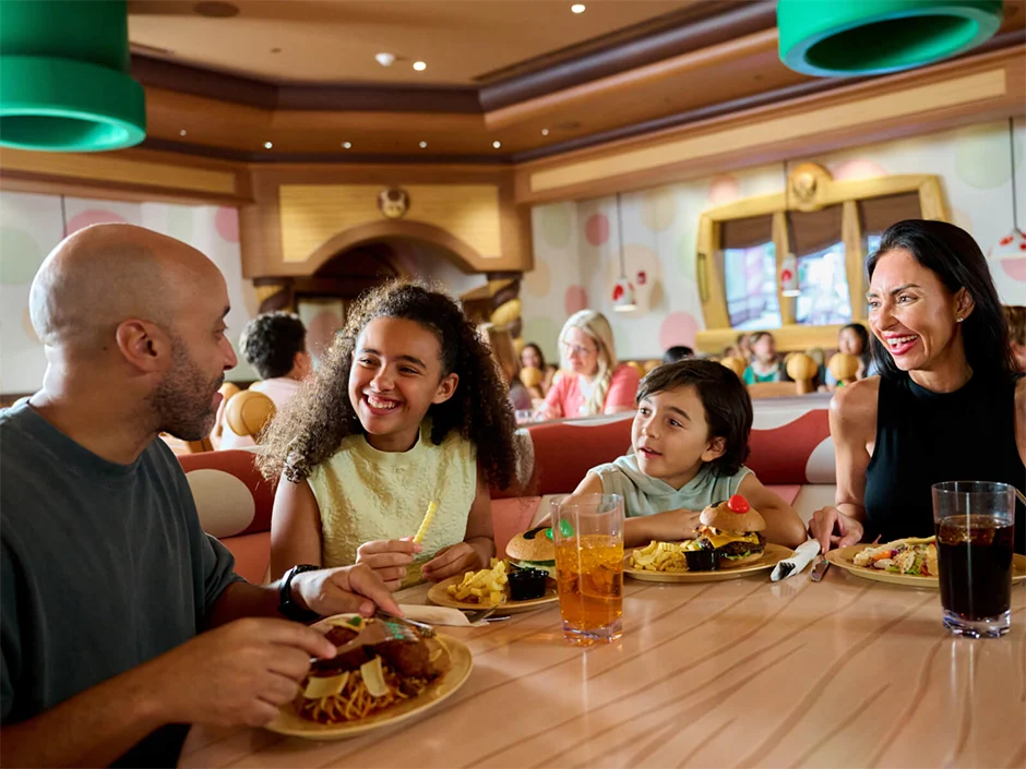 A Rainy Day Guide to Universal’s Epic Universe 6 Family dining inside Toadstool Cafe at Epic Universe