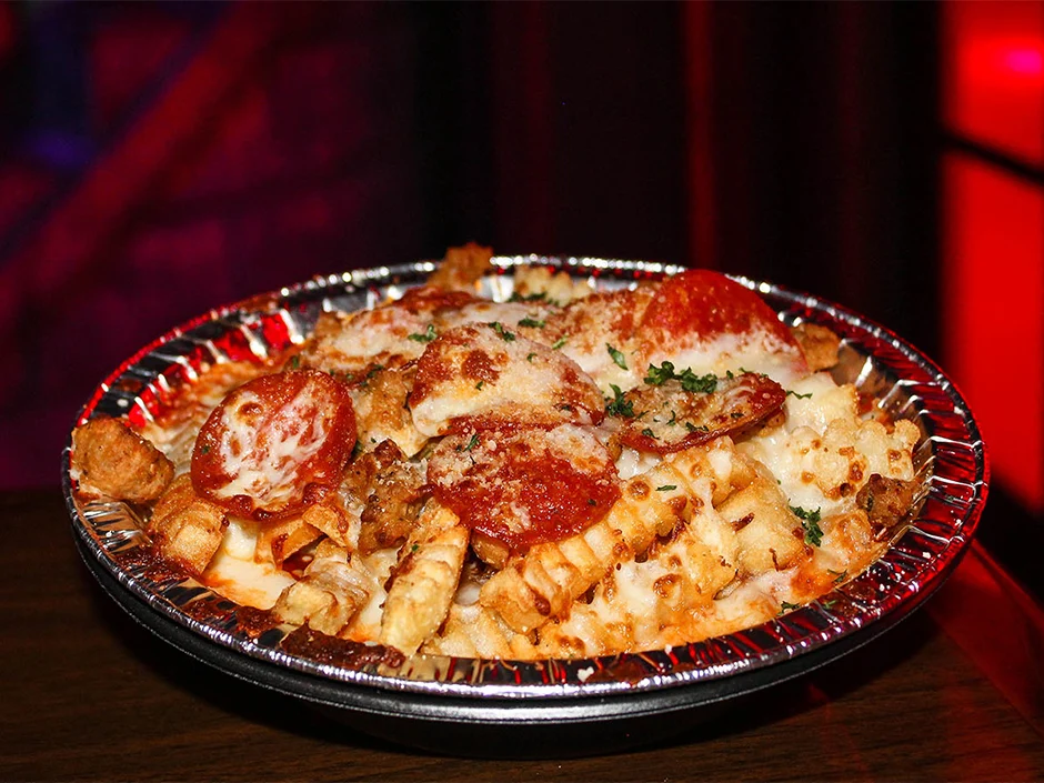 Halloween Horror Nights 2026 Tickets & Passes Guide 6 Pizza fries served at Halloween Horror Nights