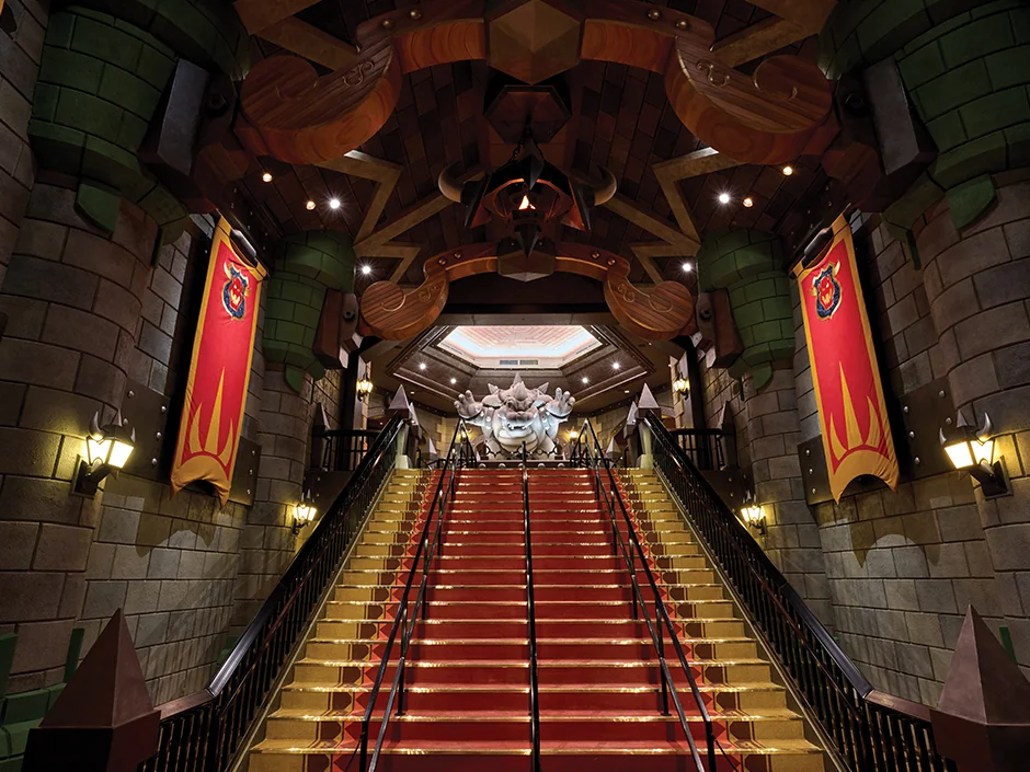 Mario Kart: Bowser's Challenge at Epic Universe: How the Race Really Works 4 Staircase and Bowser statue in the Mario Kart: Bowser’s Challenge queue