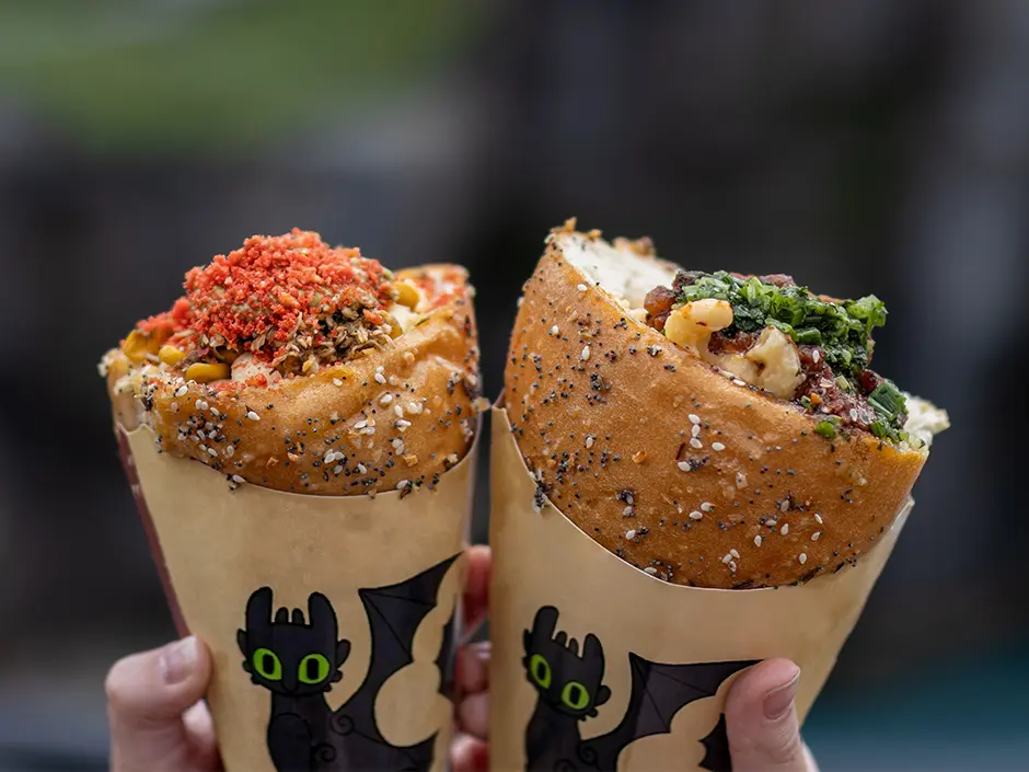 Universal Orlando's Bread Cone Craze Now Spans Two Parks 2 Two filled bread cones at Hooligan’s Grog and Gruel