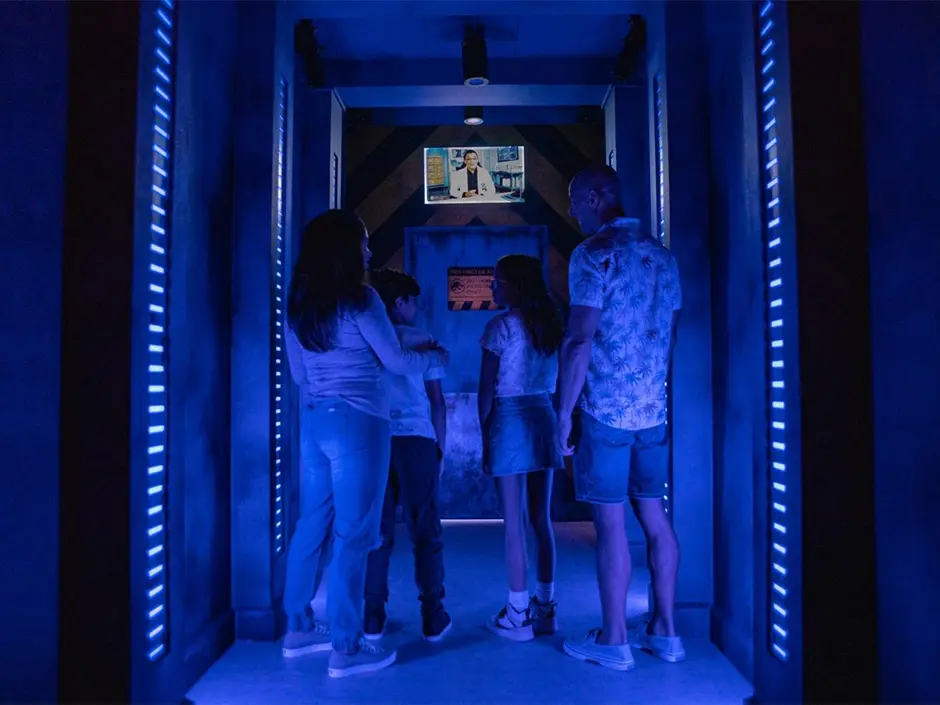Great Movie Escape Secrets Connect Jurassic World and Back to the Future 1 Guests solving a Jurassic World Escape challenge
