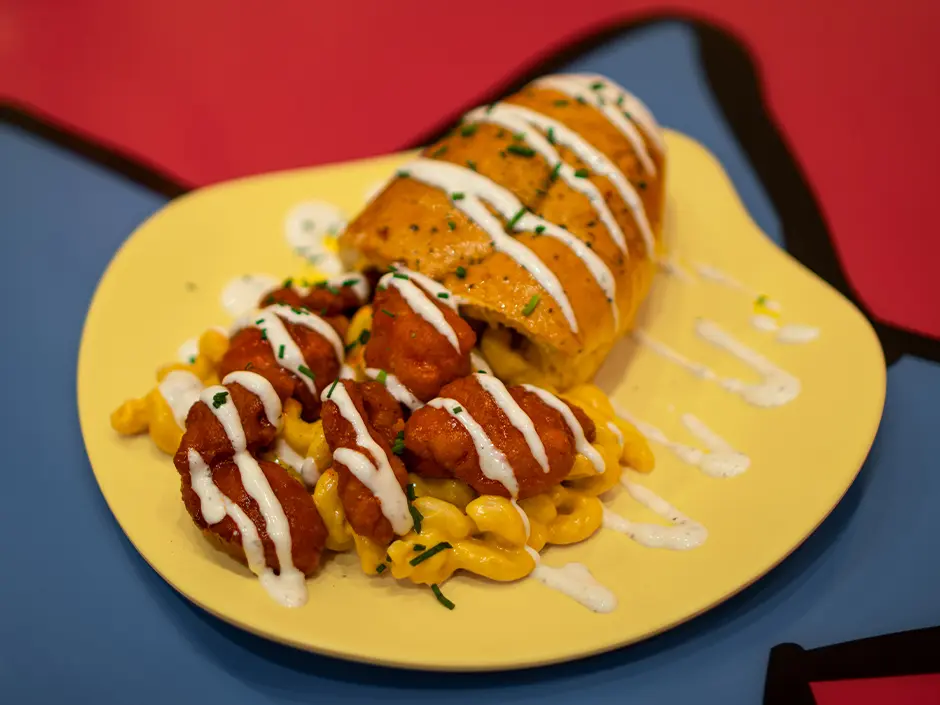 Universal Orlando's Bread Cone Craze Now Spans Two Parks 5 Morris’s Mac-nificent Mac and Cheese Cone at Circus McGurkus