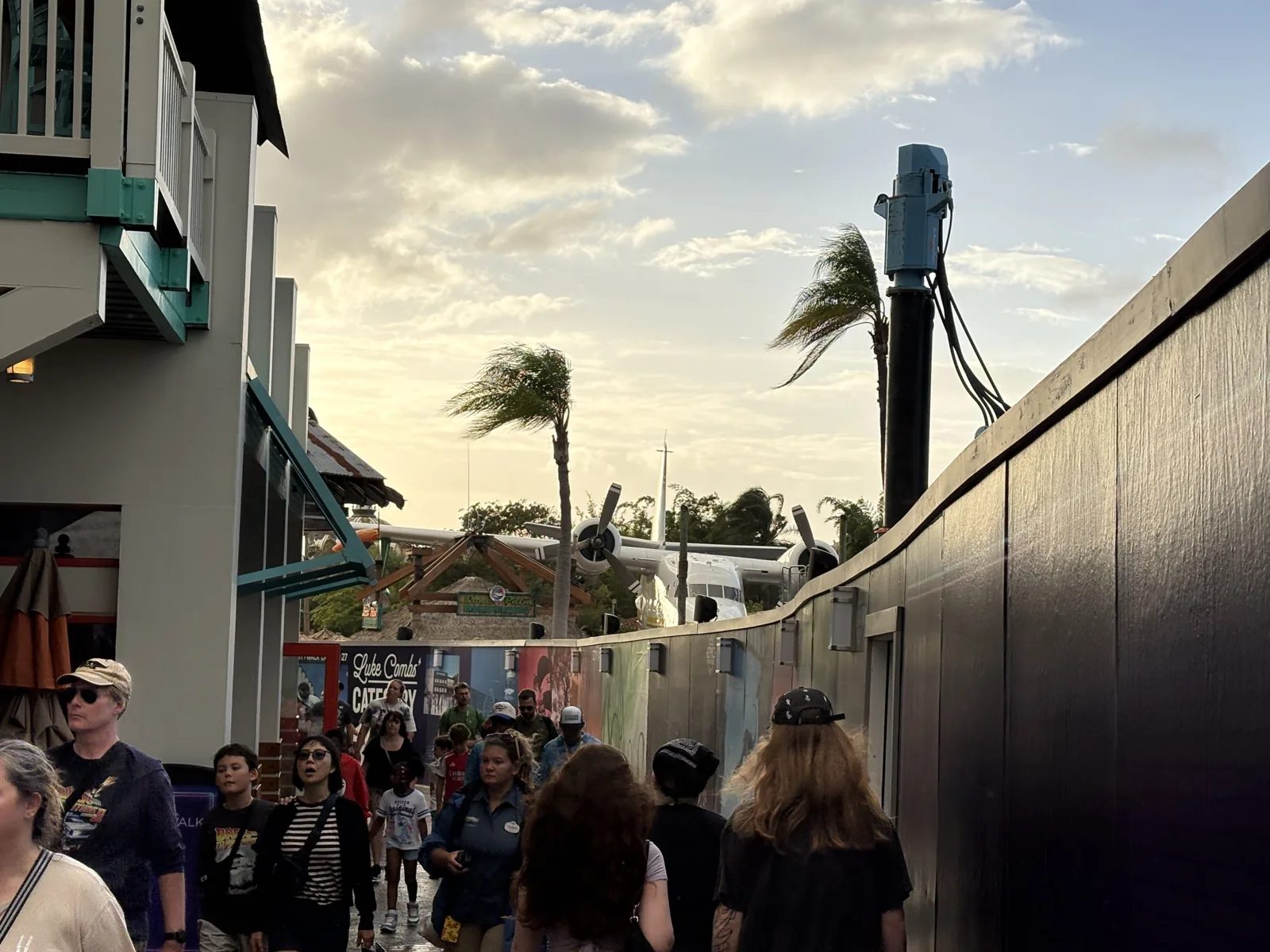 CityWalk Construction Detour Changes the Walk to Islands of Adventure 3 Guests walk beside construction walls at CityWalk