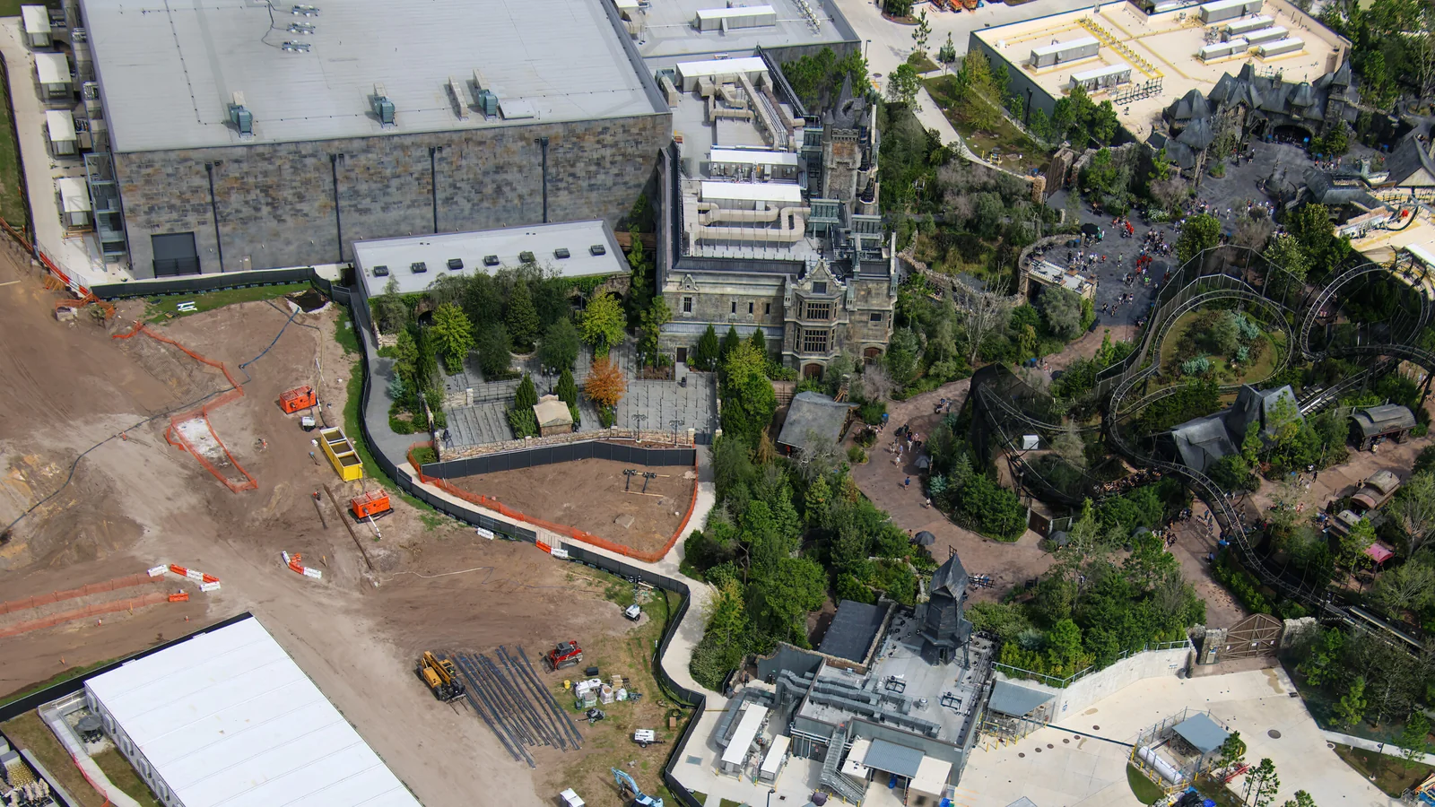 Foundation Work Advances Behind Dark Universe at Epic Universe 4 Aerial view of the Monsters Unchained building between the work site and Darkmoor Village