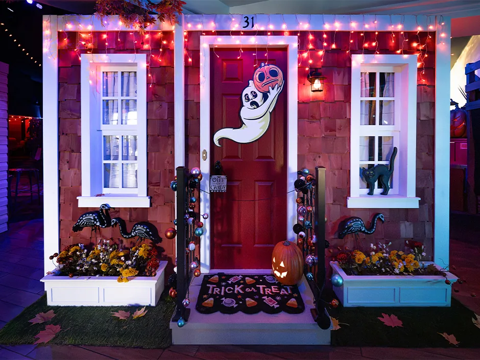 Dead Coconut Club’s Alien Invasion Brings Its First Food Menu to CityWalk 1 Halloween decorations on a house facade inside Dead Coconut Club