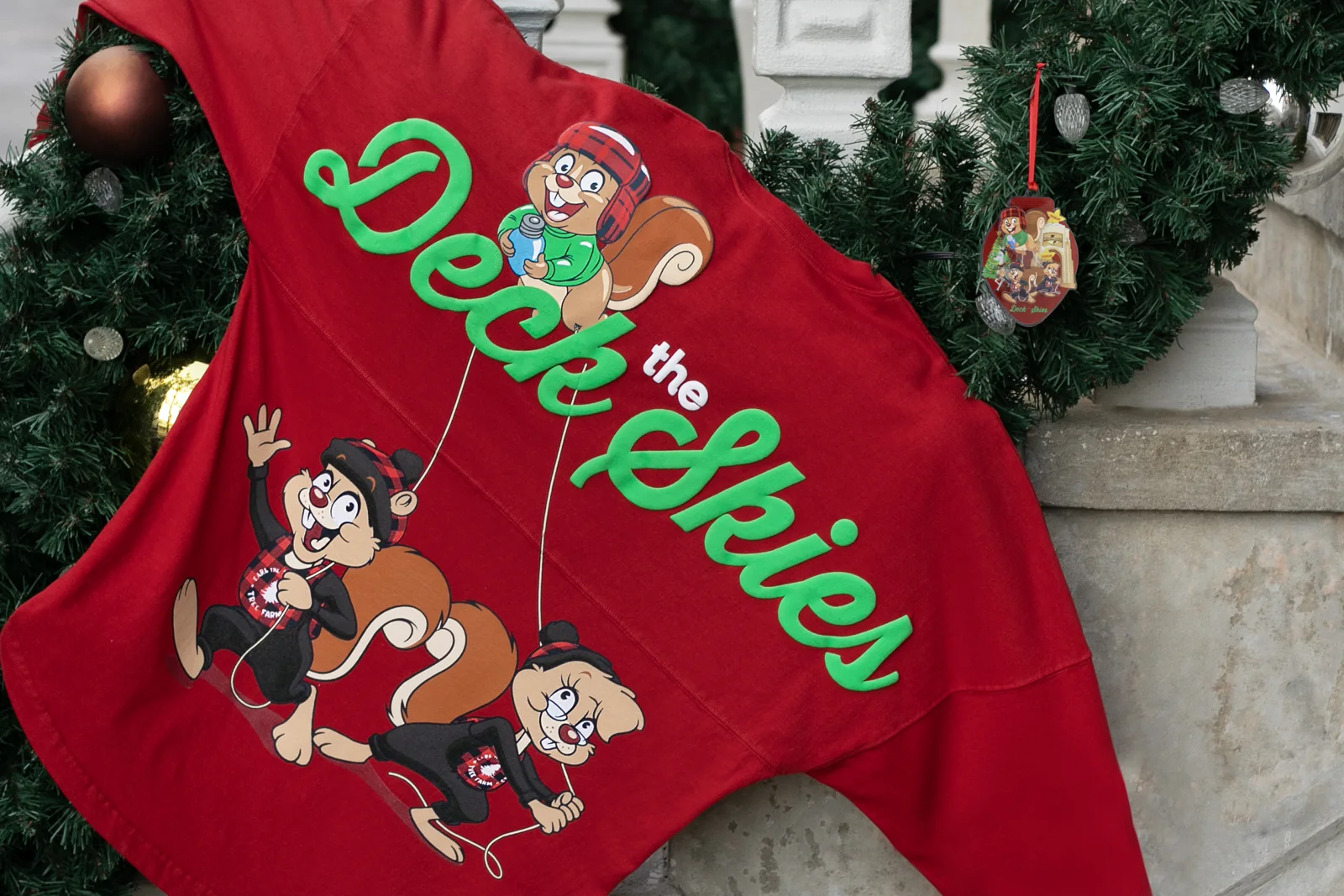 Earl the Squirrel Balloon Will Join Universal Orlando Holiday Parade 3 Red Earl the Squirrel holiday sweatshirt and themed ornaments