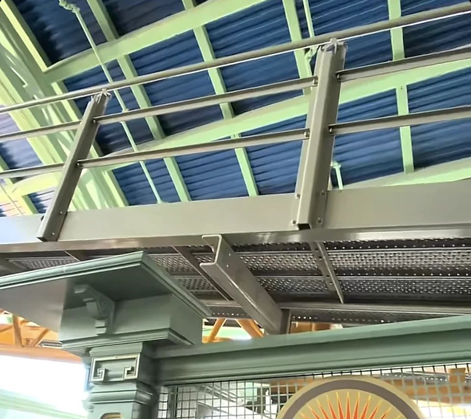Fallen Fan Reported in Stardust Racers Queue at Epic Universe 1 Metal railing and overhead structure in the Stardust Racers queue