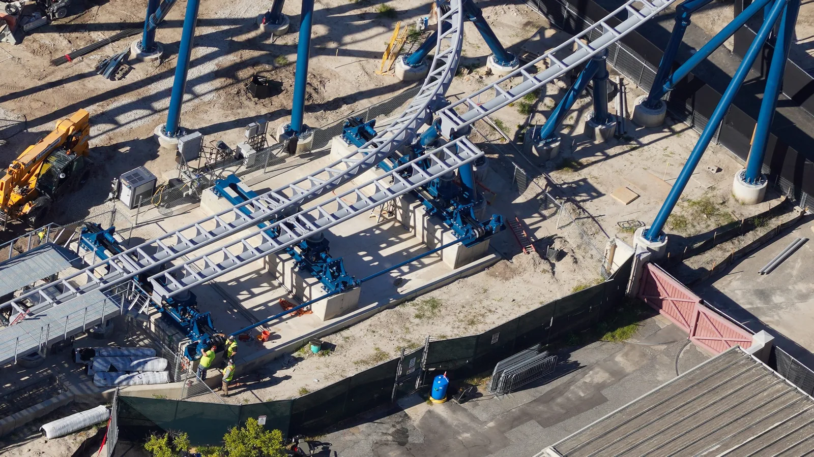Hollywood Drift Construction Photos Show Station and Track Progress at Universal Studios Florida 3 Aerial view of coaster track and blue supports under construction